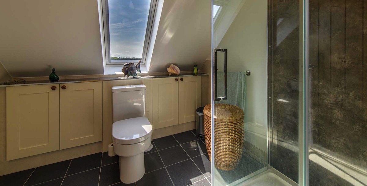 Modern new bathroom in attic space of listed building in Aberdeen City