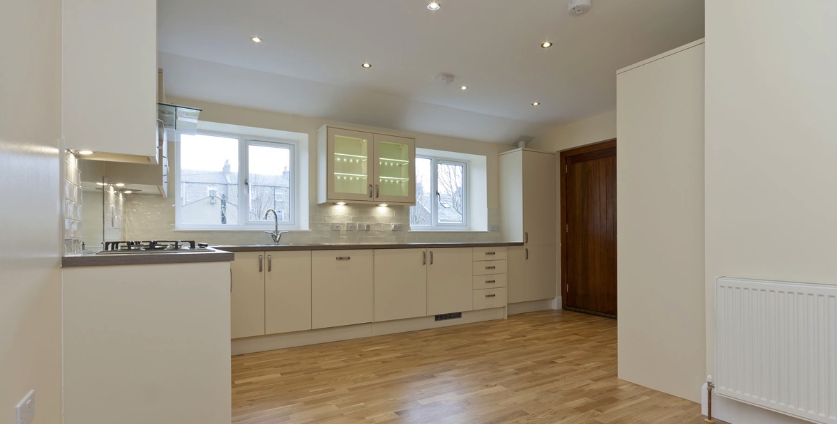 bright white new, modern kitchen, as part of a re-modelling project in the heart of Granite City