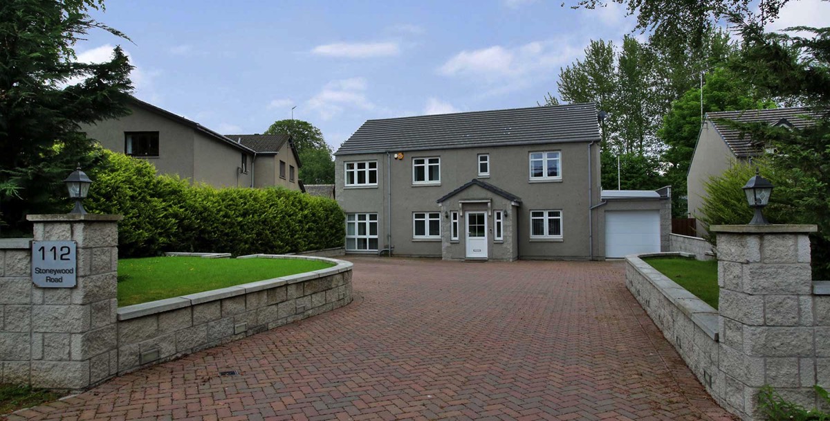 block paved drive way leading to a large detached family home in Aberdeen