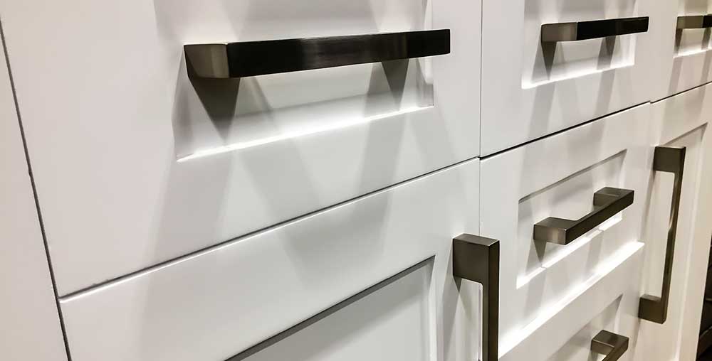 wooden kitchen drawers with contemporary handles